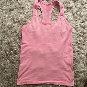 Lululemon Swiftly Tech 2.0 Racerback Tank size 8 in Pink. Hip Length. Pretty